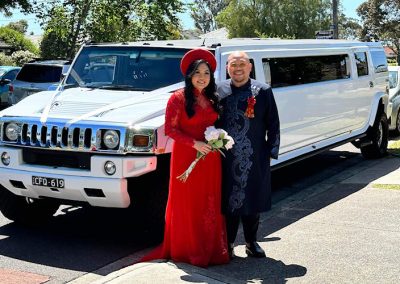 2006 White Hummer - Couple Wedding Special Event Infront of car