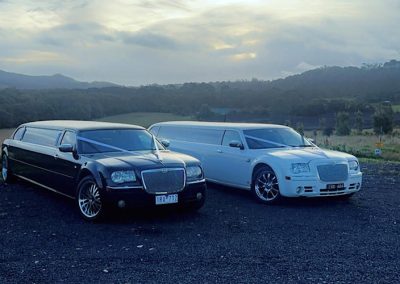 300C White Chrysler - Next to black Limo