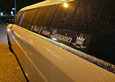 300C White Chrysler - Side View Of Limo In rain