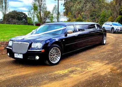 Black Chrysler Limo - Full Side view