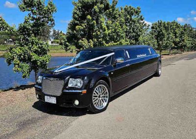Black Chrysler Limo - Semi Side View